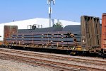 Ex BC Railway bulkhead flat IANR #866390 with a load of steel.